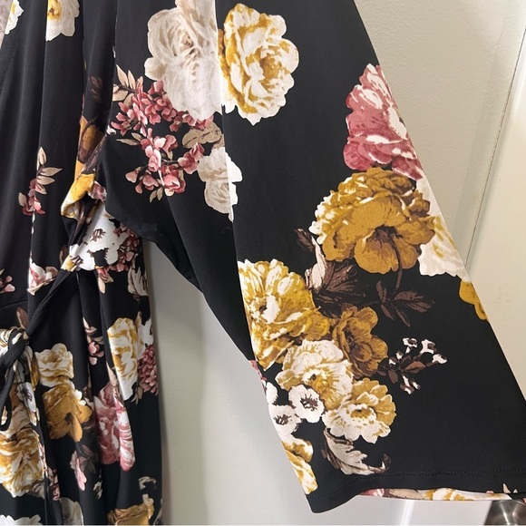Torrid Black Floral Studio Knit Wrap Peplum Top Size 4 - Picture 7 of 10